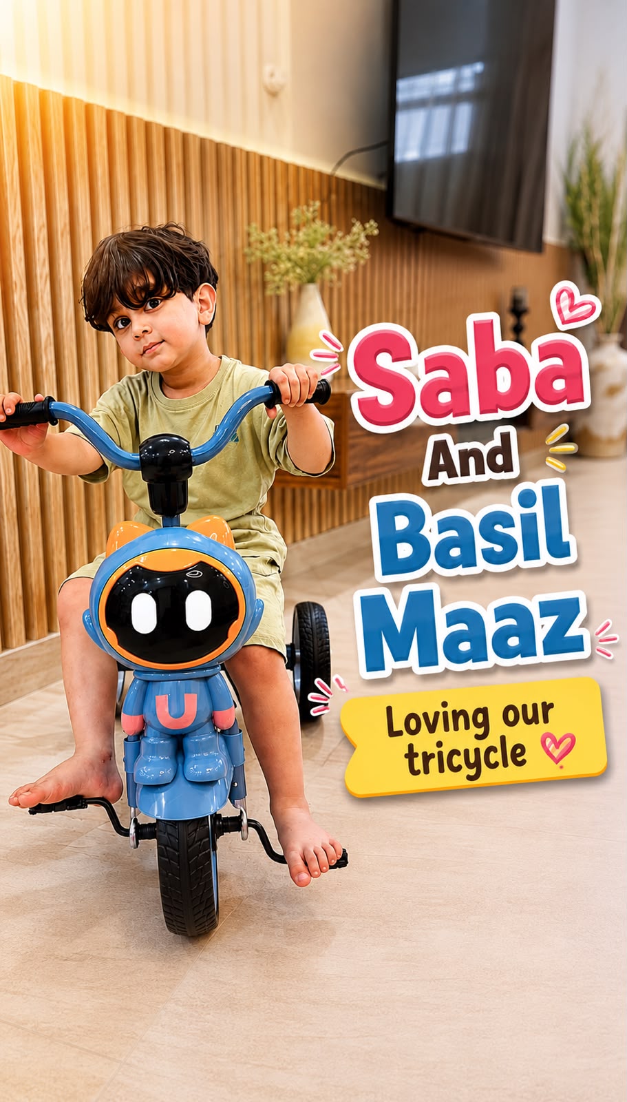 Basil Maaz riding the blue Robo Rider tricycle at home